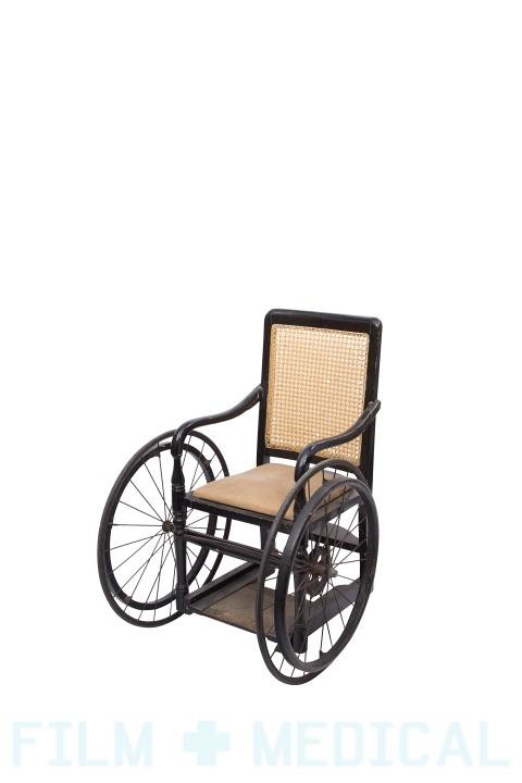 Period black wicker wheelchair